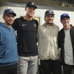 
              New York Yankees center fielder Aaron Judge, second from left, meets with Toronto Maple Leafs players Michael Bunting, left, Auston Matthews, second from right, and Mitch Marner before the Yankees' baseball against the Toronto Blue Jays in Toronto on Tuesday, Sept. 27, 2022. (Nathan Denette/The Canadian Press via AP)
            
