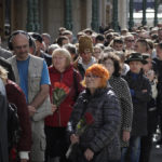 
              People line up to pay the last respects at the coffin of former Soviet President Mikhail Gorbachev outside the Pillar Hall of the House of the Unions during a farewell ceremony in Moscow, Russia, Saturday, Sept. 3, 2022. Gorbachev, who died Tuesday at the age of 91, will be buried at Moscow's Novodevichy cemetery next to his wife, Raisa, following a farewell ceremony at the Pillar Hall of the House of the Unions, an iconic mansion near the Kremlin that has served as the venue for state funerals since Soviet times. (AP Photo)
            