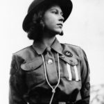 
              FILE - In this Aug. 17, 1943 file photo, Britain's Princess Elizabeth poses for a photo in a Girl Guides uniform, in Windsor Great Park, in Windsor, England.  Queen Elizabeth II, Britain’s longest-reigning monarch and a rock of stability across much of a turbulent century, has died. She was 96. Buckingham Palace made the announcement in a statement on Thursday Sept. 8, 2022. (AP Photo, File)
            