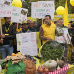 
              Leader of the League party Matteo Salvini joins an Italian farmers association's protest on high energy costs affecting production in the farming industry, in Milan, Italy, Friday, Sept. 30, 2022. (AP Photo/Antonio Calanni)
            