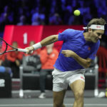 
              Team Europe's Roger Federer, ducks under a ball, as he plays with Rafael Nadal during their Laver Cup doubles match against Team World's Jack Sock and Frances Tiafoe at the O2 arena in London, Friday, Sept. 23, 2022. (AP Photo/Kin Cheung)
            