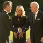 
              US President Joe Biden accompanied by First Lady Jill Biden are welcomed by Master of the Household Sir Tony Johnstone-Burt at Buckingham Palace in London, Sunday, Sept. 18, 2022. King Charles III is holding a reception at Buckingham Palace for heads of state and other leaders on Sunday evening ahead of the state funeral of Queen Elizabeth II on Monday. (AP Photo/Markus Schreiber, Pool)
            