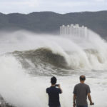 
              Waves hit a shore in Ulsan, South Korea, Tuesday, Sept. 6, 2022. The most powerful typhoon to hit South Korea in years battered its southern region Tuesday, dumping almost a meter (3 feet) of rain, destroying roads and felling power lines, leaving 20,000 homes without electricity as thousands of people fled to safer ground. (Kim Yong-tai/Yonhap via AP)
            