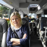 
              Swedish Prime Minister Magdalena Andersson sits onboard the Social Democrats bus heading for the city of Norrtaelje where she will be campaigning ahead of the general elections in Stockholm, Sweden, Sunday, Sept. 4, 2022. Andersson is on the campaign trail a week before the national election. She traveled by bus Sunday to communities near Stockholm seeking to win over voters concerned over gang violence and electricity bills that have risen painfully since Russia invaded Ukraine. (Jessica Gow/TTNews Agency via AP)
            