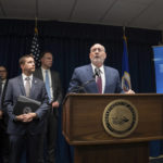 
              U.S. Attorney Andy Luger today announces a significant COVID-related fraud case based in Minnesota Tuesday, Sept. 20, 2022 Minneapolis, Minn. On the left are IRS Special Agent in Charge Justin Campbell and FBI Special Agent in Charge Michael Paul. (Glen Stubbe/Star Tribune via AP)
            