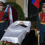
              Honour guards stand by the coffin of former Soviet President Mikhail Gorbachev inside the Pillar Hall of the House of the Unions during a farewell ceremony in Moscow, Russia, Saturday, Sept. 3, 2022. Gorbachev, who died Tuesday at the age of 91, will be buried at Moscow's Novodevichy cemetery next to his wife, Raisa, following a farewell ceremony at the Pillar Hall of the House of the Unions, an iconic mansion near the Kremlin that has served as the venue for state funerals since Soviet times. (AP Photo/Alexander Zemlianichenko)
            