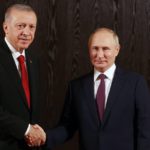 
              Russian President Vladimir Putin, right, shakes hands with Turkey's President Recep Tayyip Erdogan prior to their talks on the sidelines of the Shanghai Cooperation Organisation (SCO) summit in Samarkand, Uzbekistan, Friday, Sept. 16, 2022. (Alexandr Demyanchuk, Sputnik, Kremlin Pool Photo via AP)
            