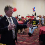 
              FILE - Jim Marchant, who is a Nevada secretary of candidate in 2022, attends a Republican election night watch party Nov. 3, 2020, in Las Vegas. An Associated Press review has found that more than a quarter of Republican candidates for statewide office that play some role in overseeing, certifying or defending elections across 38 states supported overturning the 2020 presidential election. (AP Photo/John Locher, File)
            
