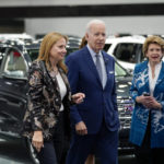 
              President Joe Biden speaks with Mary Barra, CEO of General Motors, and Sen. Debbie Stabenow, D-Mich., right, during a tour at the Detroit Auto Show, Wednesday, Sept. 14, 2022, in Detroit. (AP Photo/Evan Vucci)
            