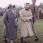 
              Britain's Queen Elizabeth II, center, walks with Queen Elizabeth, the Queen Mother and the Duke of Beaufort, April 3, 1957. (AP Photo)
            