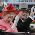 
              FILE - In this June, 16, 2011 file photo Britain's Queen Elizabeth II with Prince Philip arrive by horse drawn carriage in the parade ring on the third day, traditionally known as Ladies Day, of the Royal Ascot horse race meeting at Ascot, England. Queen Elizabeth II, Britain’s longest-reigning monarch and a rock of stability across much of a turbulent century, has died. She was 96. Buckingham Palace made the announcement in a statement on Thursday Sept. 8, 2022. (AP Photo/Alastair Grant, File)
            
