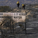 
              Fire crews work a wildfire on Thursday, Sept. 1, 2022, near Dulzura, Calif. California wildfires chewed through rural areas north of Los Angeles and east of San Diego on Thursday, racing through bone-dry brush and prompting evacuations as the state sweltered under a heat wave that could last through Labor Day. (AP Photo/Gregory Bull)
            
