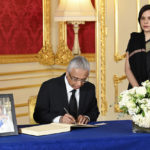 
              Prime Minister of Mauritius Pravind Jugnauth with his wife Kobita Jugnauth sign a book of condolences at Lancaster House following the death of Queen Elizabeth II, in London, Sunday, Sept. 18, 2022. ( Jonathan Hordle/Pool Photo via AP)
            