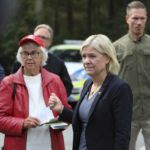 
              Sweden's Prime Minister and Party leader of the Social Democrats Magdalena Andersson arrives to vote for the general elections at a polling station in Nacka, outside Stockholm, Sweden, Sunday, Sept 11, 2022. Sweden is holding an election Sunday that is expected to boost a populist anti- immigration party that is vowing to crack down on gang violence that has shaken many people’s sense of security. (Ali Lorestani/TT News Agency via AP)
            