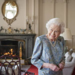 
              FILE - Britain's Queen Elizabeth II smiles while receiving the President of Switzerland Ignazio Cassis and his wife Paola Cassis during an audience at Windsor Castle in Windsor, England, Thursday, April 28, 2022. Queen Elizabeth II, Britain’s longest-reigning monarch and a rock of stability across much of a turbulent century, has died. She was 96. Buckingham Palace made the announcement in a statement on Thursday Sept. 8, 2022.(Dominic Lipinski/Pool Photo via AP, File)
            