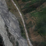 
              This satellite image provided by Maxar Technologies shows people and vehicles queuing for crossing the Upper Lars checkpoint on the Russian-Georgia border, on Tuesday Sept. 27, 2022, after Russian President Vladimir Putin announced a partial mobilization in Russia. (Satellite image ©2022 Maxar Technologies via AP)
            