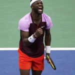 
              Frances Tiafoe, of the United States, celebrates after winning a point against Rafael Nadal, of Spain, during the fourth round of the U.S. Open tennis championships, Monday, Sept. 5, 2022, in New York. (AP Photo/Eduardo Munoz Alvarez)
            