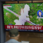 
              A TV screen showing a news program reporting about North Korea's missile launch with file footage, is seen at the Seoul Railway Station in Seoul, South Korea, Saturday, Oct. 1, 2022. On Saturday, North Korea fired two short-range ballistic missiles toward its eastern waters, South Korean and Japanese officials said, making it the fourth round of weapons launches this week that are seen as a response to military drills among its rivals. (AP Photo/Lee Jin-man)
            