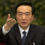 
              FILE - Chen Quanguo, Communist Party secretary of China's Xinjiang Uighur Autonomous Region, gestures while speaking during a group discussion meeting on the sidelines of China's National People's Congress (NPC) at the Great Hall of the People in Beijing, Tuesday, March 12, 2019. China has responded furiously to a United Nations report on alleged human rights abuses in its northwestern Xinjiang region targeting Uyghurs and other mainly Muslim ethnic minorities. (AP Photo/Mark Schiefelbein, File)
            