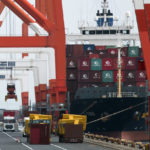 
              FILE - A crane prepares to unload a container from a semi-trailer truck at the Aomi wharf in Tokyo on Sept. 17, 2021. The Office of the U.S. Trade Representative on Friday, Sept. 23, 2022, released its negotiating objectives for the Indo-Pacific Economic Framework, a deal with the 12 nations launched in May. Among them, the U.S. wants the Indo-Pacific countries to improve their labor and environmental standards and ensure their markets remain open to competition, while also taking steps to ease supply-chain backlogs at border crossings. (AP Photo/Hiro Komae, File)
            