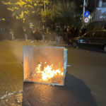 
              In this Tuesday, Sept. 20, 2022, photo taken by an individual not employed by the Associated Press and obtained by the AP outside Iran, a trash bin is burning during a protest over the death of a young woman who had been detained for violating the country's conservative dress code, in downtown Tehran, Iran. Iran faced international criticism on Tuesday over the death of a woman held by its morality police, which ignited three days of protests, including clashes with security forces in the capital and other unrest that claimed at least three lives. (AP Photo)
            
