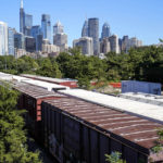 
              Freight train cars sit idle on tracks in Philadelphia, Wednesday, Sept. 14, 2022.  President Joe Biden said Thursday that a tentative railway labor agreement has been reached, averting a strike that could have been devastating to the economy before the pivotal midterm elections. (AP Photo/Matt Rourke)
            