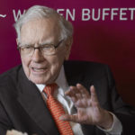 
              FILE - In this May 5, 2019, file photo, Warren Buffett, Chairman and CEO of Berkshire Hathaway, speaks during a game of bridge following the annual Berkshire Hathaway shareholders meeting in Omaha, Neb. Warren Buffett's company picked up another $368 million worth of Occidental Petroleum stock this week to give it control of nearly 21% of the oil producer.  (AP Photo/Nati Harnik, File)
            