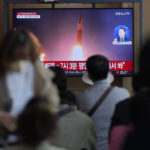 
              A TV screen showing a news program reporting about North Korea's missile launch with file imagery, is seen at the Seoul Railway Station in Seoul, South Korea, Saturday, Oct. 1, 2022. On Saturday, North Korea fired two short-range ballistic missiles toward its eastern waters, South Korean and Japanese officials said, making it the fourth round of weapons launches this week that are seen as a response to military drills among its rivals. (AP Photo/Lee Jin-man)
            