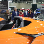 
              President Joe Biden listens during a tour at the Detroit Auto Show, Wednesday, Sept. 14, 2022, in Detroit. From left, Sen. Debbie Stabenow, D-Mich., Mary Barra, CEO of General Motors, Biden, Ray Curry, President of the United Auto Workers, obscured, Rep. Debbie Dingell, D-Mich., and Michigan Gov. Gretchen Whitmer. (AP Photo/Evan Vucci)
            