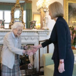 
              Britain's Queen Elizabeth II, left, welcomes Liz Truss during an audience at Balmoral, Scotland, where she invited the newly elected leader of the Conservative party to become Prime Minister and form a new government, Tuesday, Sept. 6, 2022. (Jane Barlow/Pool Photo via AP)
            
