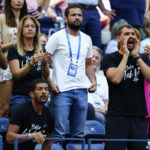 
              Coaches and supporters shout their support for Ons Jabeur, of Tunisia, during the women's singles final against Iga Swiatek, of Poland, at the U.S. Open tennis championships, Saturday, Sept. 10, 2022, in New York. (AP Photo/Frank Franklin II)
            