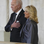 
              US President Joe Biden and First Lady Jill Biden view the coffin of Queen Elizabeth II lying in state on the catafalque in Westminster Hall, at the Palace of Westminster, London, Sunday Sept. 18, 2022. (Jacob King/Pool Photo via AP)
            