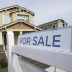 
              FILE - A for sale sign is posted in front of a home in Sacramento, Calif., Thursday, March 3, 2022. The Federal reserve is expected at its meeting this week to raise its key interest rate by a substantial three-quarters of a point for the third consecutive time. Another hike that large would lift its benchmark rate — which affects many consumer and business loans — to a range of 3% to 3.25%, the highest level in 14 years.(AP Photo/Rich Pedroncelli, File)
            