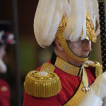 
              A member of The King's Body Guards of the Honourable Corps of Gentlemen at Arms performs guard duties around the coffin of Queen Elizabeth II, Lying in State inside Westminster Hall, at the Palace of Westminster, in London, Sunday, Sept. 18, 2022, ahead of her funeral on Monday. (AP Photo/Vadim Ghirda, pool)
            