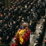 
              King Charles III, Camilla, Queen Consort and other members of the Royal family follow the coffin of Queen Elizabeth II as it is carried into Westminster Abbey ahead of her State Funeral, in London, Monday Sept. 19, 2022. The Queen, who died aged 96 on Sept. 8, will be buried at Windsor alongside her late husband, Prince Philip, who died last year. (Jack Hill/Pool Photo via AP)
            