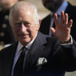 
              Britain's King Charles III waves to members of the public as he arrives at St. Anne's Cathedral to attend a Service of Reflection for the life of Her Majesty The Queen Elizabeth in Belfast, Tuesday, Sept. 13, 2022. King Charles III and Camilla, the Queen Consort, flew to Belfast from Edinburgh on Tuesday, the same day the queen’s coffin will be flown to London from Scotland. (AP Photo/Gregorio Borgia)
            