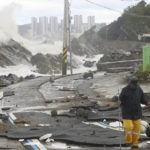 
              A road is damaged as waves hit a shore in Ulsan, South Korea, Tuesday, Sept. 6, 2022. The most powerful typhoon to hit South Korea in years battered its southern region Tuesday, dumping almost a meter (3 feet) of rain, destroying roads and felling power lines, leaving 20,000 homes without electricity as thousands of people fled to safer ground. (Kim Yong-tai/Yonhap via AP)
            