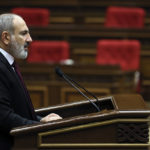 
              Armenian Prime minister Nikol Pashinyan delivers his speech at the National Assembly of Armenia in Yerevan, Armenia, Tuesday, Sept. 13, 2022. Armenia's prime minister says that 49 soldiers have been killed in nighttime attacks by Azerbaijan. (Tigran Mehrabyan/PAN Photo via AP)
            