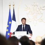 
              French President Emmanuel Macron delivers a speech during the French ambassadors' conference at the Elysee Palace in Paris, Thursday, Sept.1, 2022. French President Emmanuel Macron vowed to maintain France's humanitarian, economic and military support to Ukraine and strengthen Europe's unity to put pressure on Russia and prevent it from winning the war it is waging in Ukraine. (Mohammed Badra, Pool via AP)
            