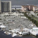 
              Damaged structures are seen in the wake of Hurricane Ian, Thursday, Sept. 29, 2022, in Fort Myers Beach, Fla. (AP Photo/Wilfredo Lee)
            