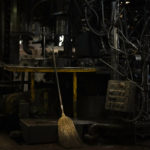 
              A broom leans against a machine in the factory of the French glassmaker Duralex, in La Chapelle Saint-Mesmin, central France, Wednesday, Sept. 7, 2022. Iconic French tableware brand Duralex is joining a growing array of European firms that are reducing and halting production because of soaring energy costs. (AP Photo/Thibault Camus)
            