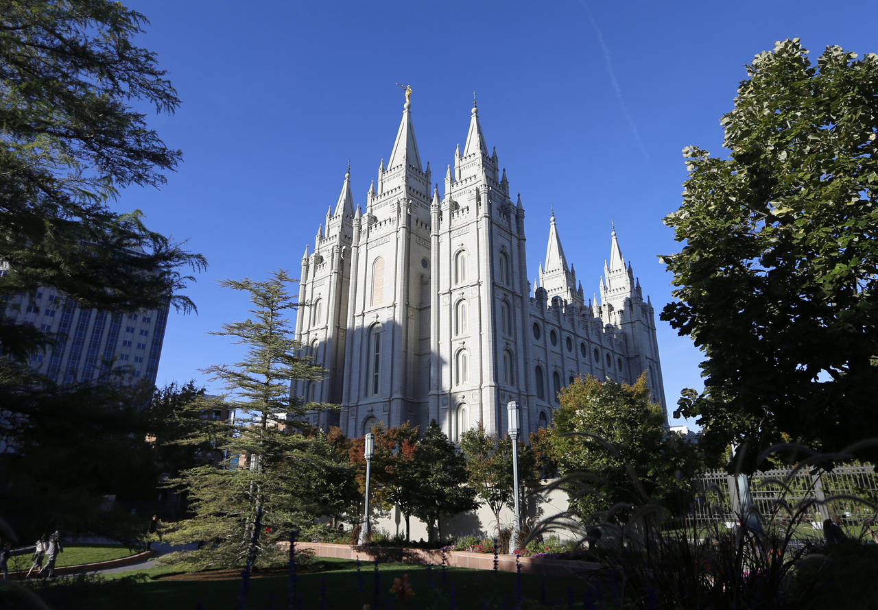 FILE - The Salt Lake Temple stands at Temple Square in Salt Lake City on Oct. 5, 2019. Merrill Nels...