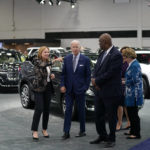 
              President Joe Biden listens as Mary Barra, CEO of General Motors, left, speaks during a tour at the Detroit Auto Show, Wednesday, Sept. 14, 2022, in Detroit. Ray Curry, President of the United Auto Workers, second from right, listens. (AP Photo/Evan Vucci)
            