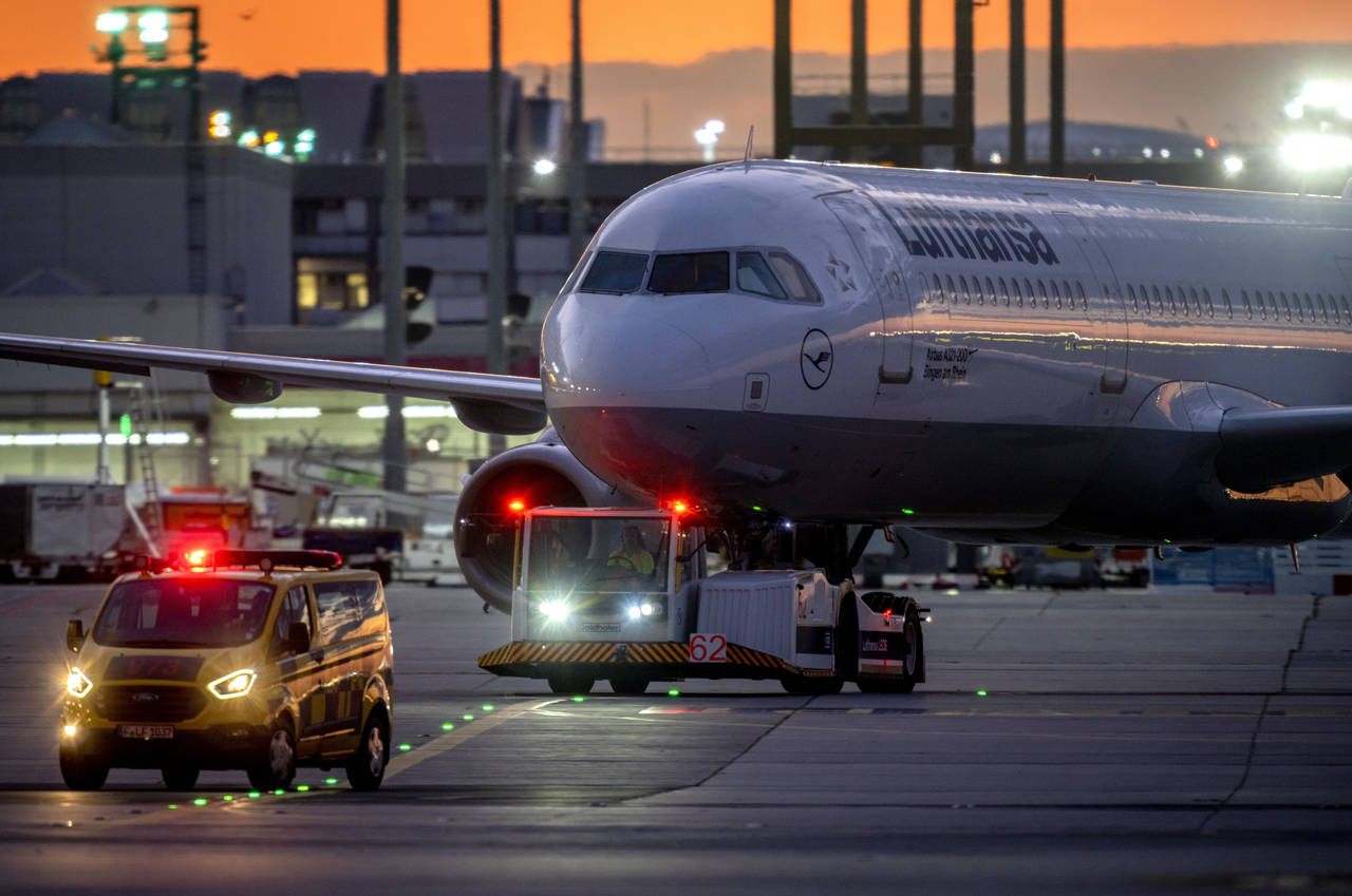 A Lufthansa aircrafts is pulled to a park position at the airport in Frankfurt, Germany, Friday, Se...