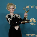 
              Julia Garner poses in the pressroom with the award for outstanding supporting actress in a drama series at the 74th Primetime Emmy Awards on Monday, Sept. 12, 2022, at the Microsoft Theater in Los Angeles. (AP Photo/Jae C. Hong)
            