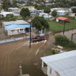 
              Streets are flooded on Salinas Beach after the passing of Hurricane Fiona in Salinas, Puerto Rico, Monday, Sept. 19, 2022. (AP Photo/Alejandro Granadillo)
            