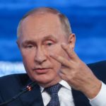 
              Russian President Vladimir Putin gestures while speaking during a plenary session at the Eastern Economic Forum in Vladivostok, Russia, Wednesday, Sept. 7, 2022. (Sergei Bobylev/TASS News Agency Host Pool Photo via AP)
            