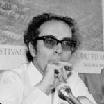 
              FILE - Film director Jean-Luc Godard smokes at Cannes festival, France on May 25, 1982. Director Jean-Luc Godard, an icon of French New Wave film who revolutionized popular 1960s cinema, has died, according to French media. He was 91. Born into a wealthy French-Swiss family on Dec. 3, 1930, in Paris, the ingenious "enfant terrible" stood for years as one of the world's most vital and provocative directors in Europe and beyond — beginning in 1960 with his debut feature "Breathless." (AP Photo/Jean-Jacques Levy, File)
            