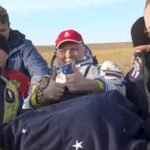 
              In this image taken from video distributed by Roscosmos State Space Corporation, Russian technical specialists carry Russian cosmonaut Oleg shortly after the landing of the Russian Soyuz MS-21 space capsule southeast of the Kazakh town of Zhezkazgan, Kazakhstan, Thursday, Sept. 29, 2022. Three Russian cosmonauts returned safely from a mission to the International Space Station. The Soyuz MS-21 spacecraft carrying Oleg Artemyev, Denis Matveyev and Sergey Korsakov touched down softly at 4:57 p.m. (1057 GMT) Thursday at a designated site in the steppes of Kazakstan about 150 kilometers (about 90 miles) southeast of the city of Zhezkazgan. (Roscosmos State Space Corporation via AP)
            