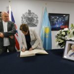 
              A couple write in the book of remembrance of Queen Elizabeth II in the Embassy of the United Kingdom in Nur-Sultan, Kazakhstan, Friday, Sept. 9, 2022. Queen Elizabeth II, Britain's longest-reigning monarch and a rock of stability across much of a turbulent century, died Thursday after 70 years on the throne. She was 96. (AP Photo)
            